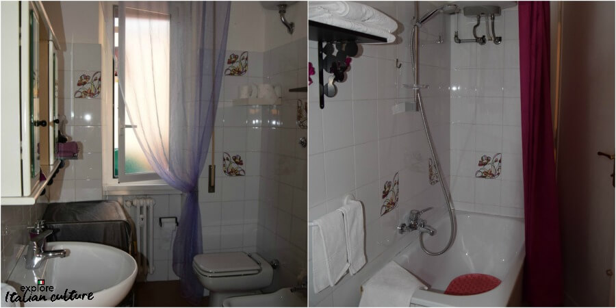 The bathroom in Laura's apartment, with bath and shower over, basin, toilet and bidet.