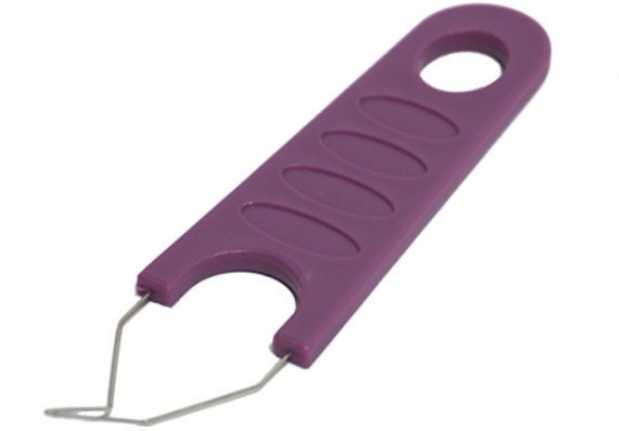 Dog tick key style remover.