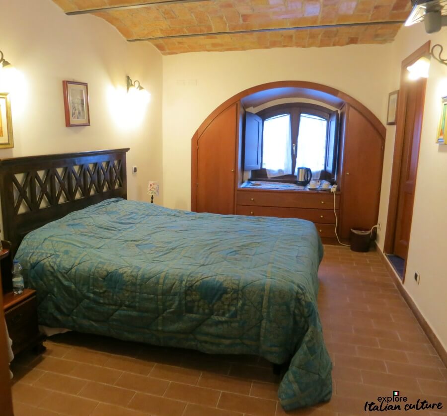 On of the Hotel Gea's double bedrooms. Hotel Gea double bedroom with large bed and arched ceiling.