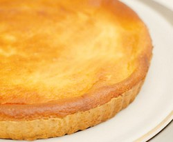 A baked Italian cheesecake complete