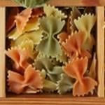 A box of multi-colored Italian pasta