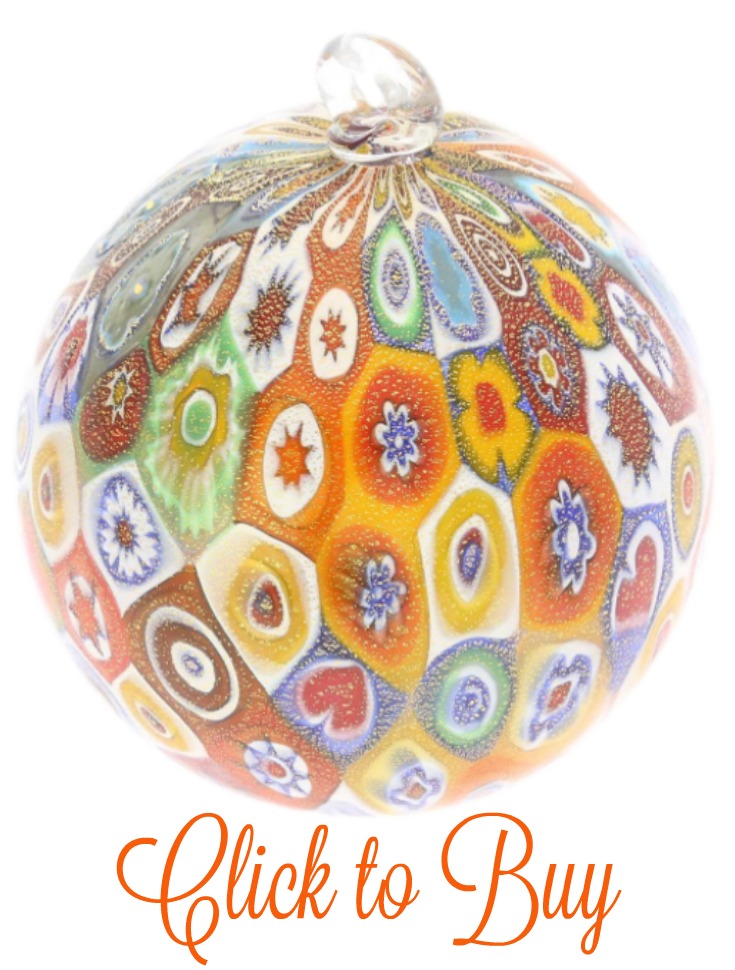 A gold coloured Christmas ornament.