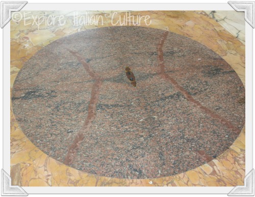 Beautiful red marble floor of the Pantheon with drainage hole for rain Beautiful red marble floor of the Pantheon with drainage hole for rain