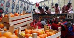 Crates of oranges on the back of a truck